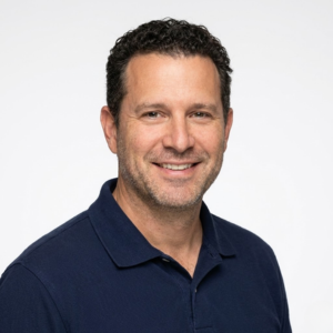 Portrait of a satisfied B2B client providing a positive testimonial for Wair air filtration solutions