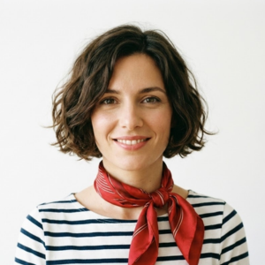 Portrait of a smiling female client providing a customer testimonial for Wair air filtration services