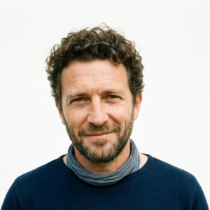 Headshot of a modern business owner featured in a recent air filtration success case