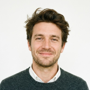 Portrait of a satisfied male client providing a 5-star review for Wair air filtration solutions