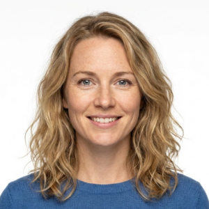 Portrait of a smiling female client providing a positive testimonial