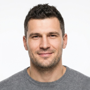 A smiling facility manager endorsing the reliability of the air filter products